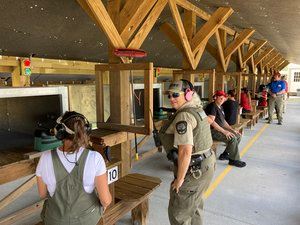 Student and sheriff instructor